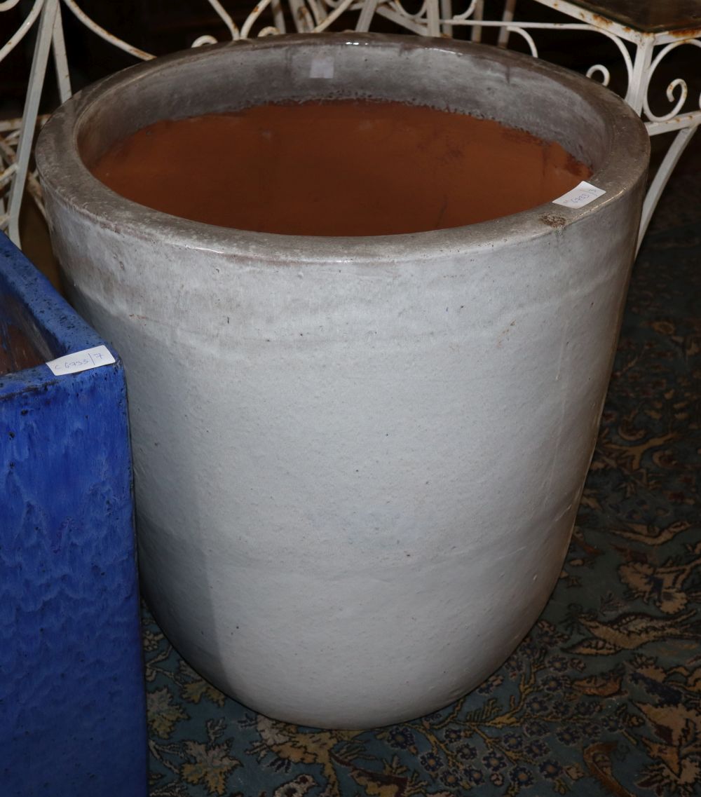 A large white glazed garden planter, 59cm diameter